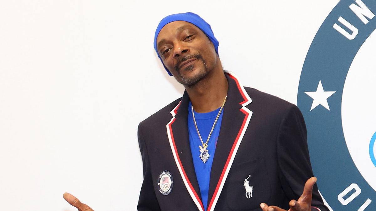 Snoop Dogg celebrates with US swimmer’s wife during gold medal race in heartwarming moment