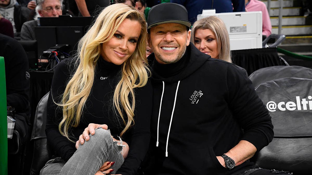 Jenny McCarthy shows off Donnie Wahlberg’s abs in shirtless snaps as she celebrates ‘hot’ husband’s birthday